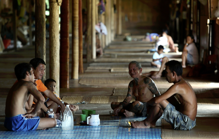 Socialising with Iban Elders is a typical longhouse culture experience.