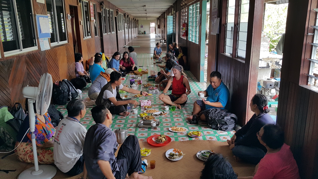 A longhouse culture is eating with Ibans on the floor of a longhouse. At Rumah Encharang, Banting, Sri Aman